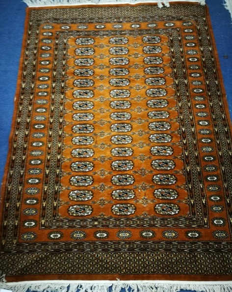 An Afghan rug 180cm x 120cm